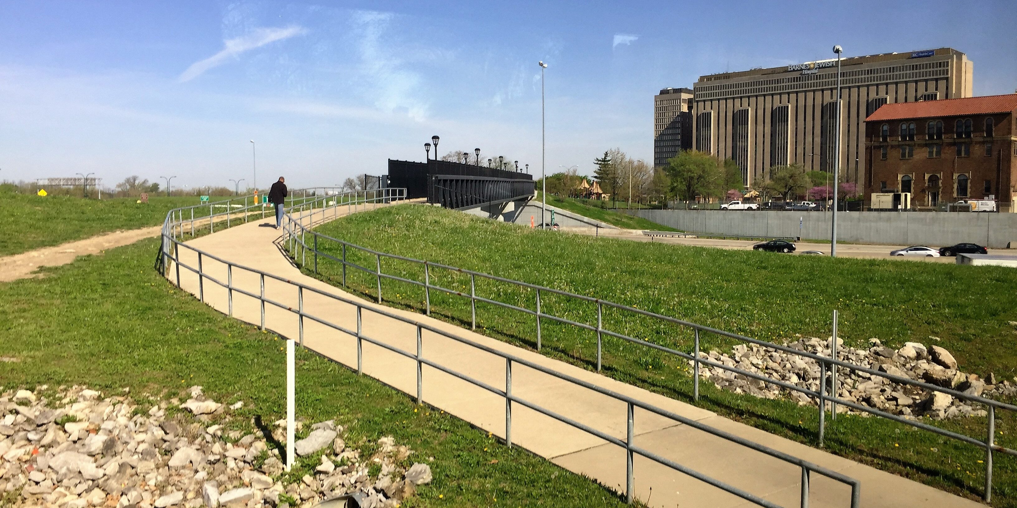 Sidewalk built over I-64 to connect a residential neighborhood with jobs and services.