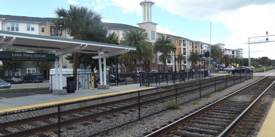 train tracks with building