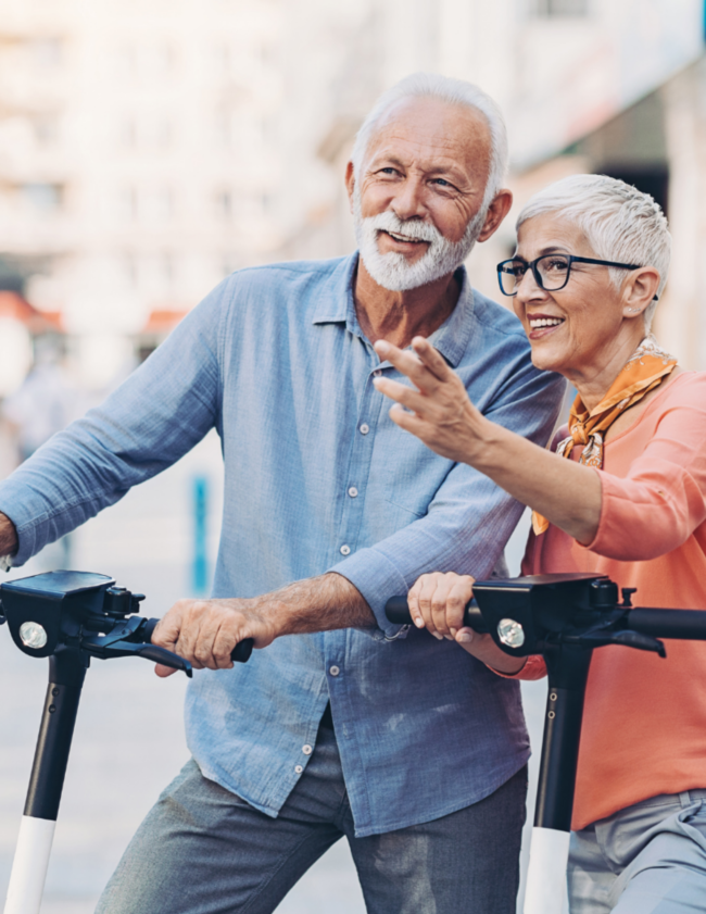 woman and man on scooters