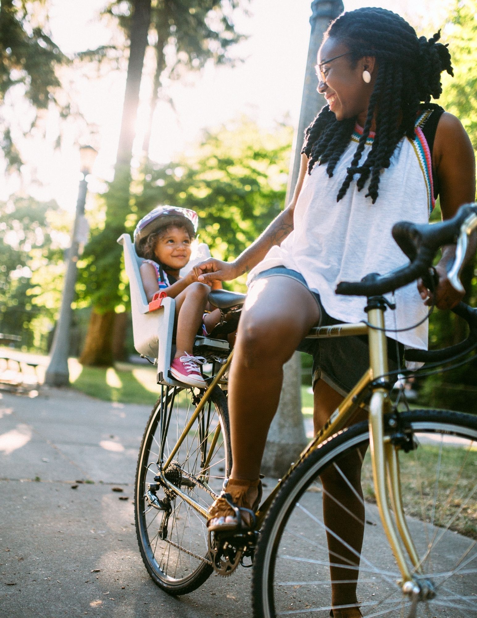 woman and child on bike