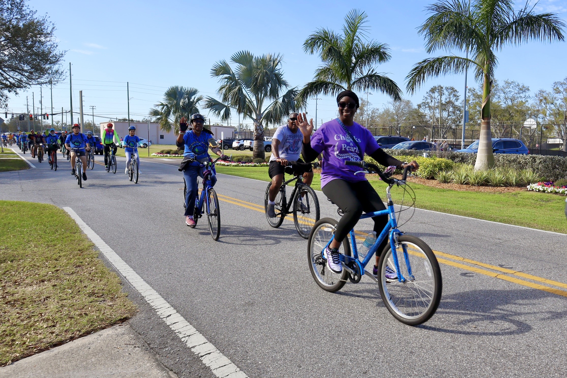three people riding on bikes