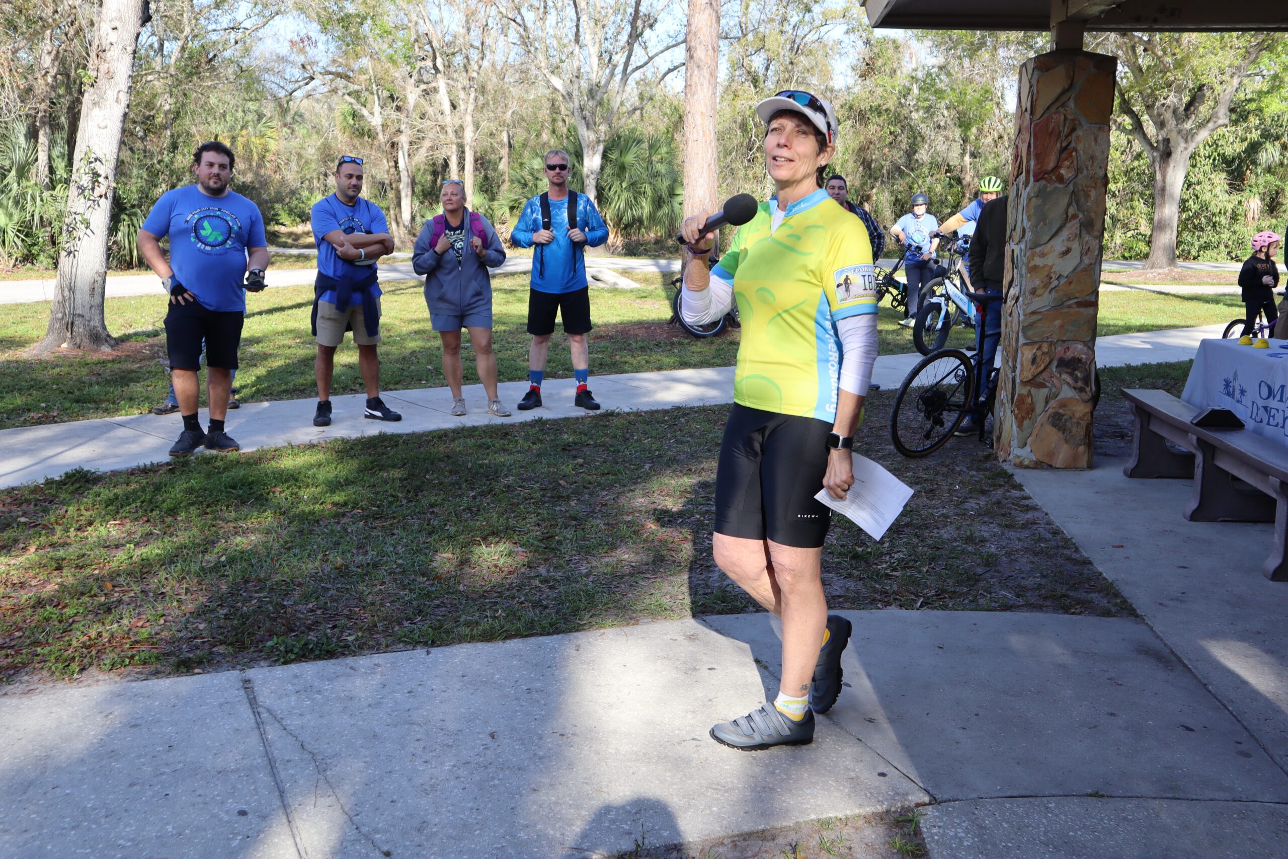 woman speaking to group of people