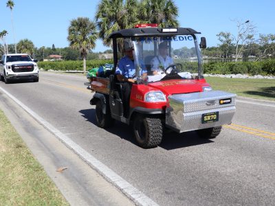 Paramedic vehicle riding down paved road