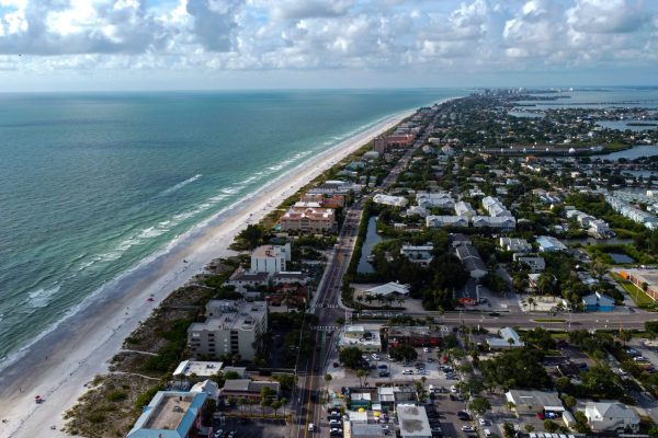 aerial view of a city on the coastline